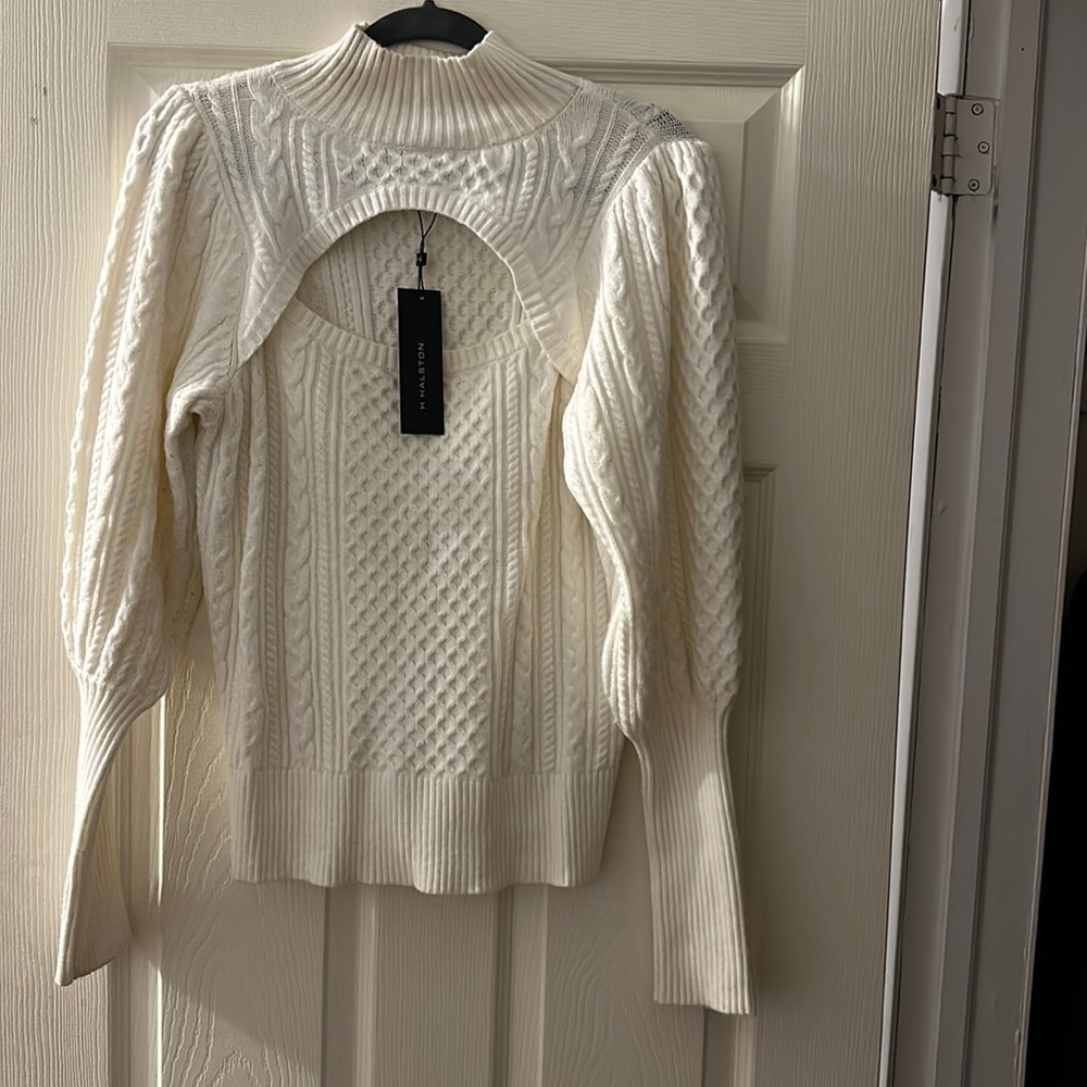 Beautiful cream sweater.  Size Small (but runs big)